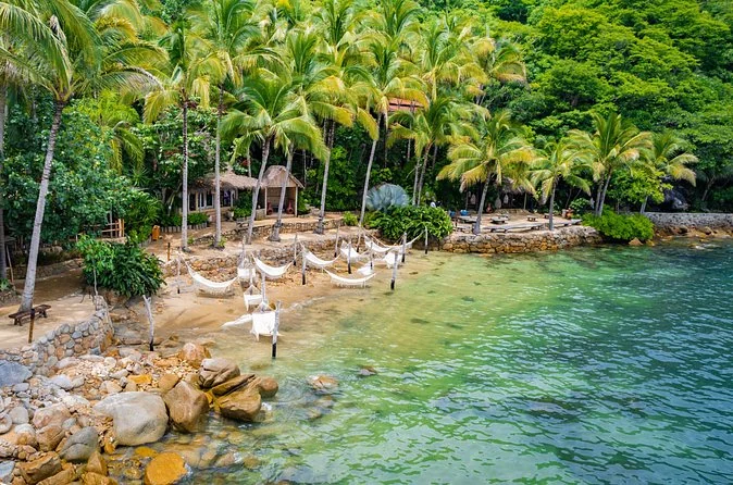 A sheltered beach and turquoise water at Las Caletas