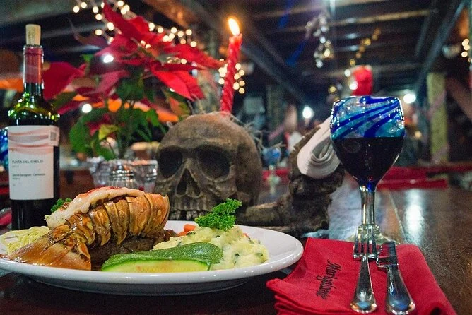 A plated dinner on a pirate ship table